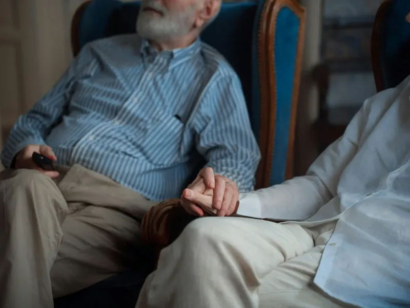 Couple holding hands