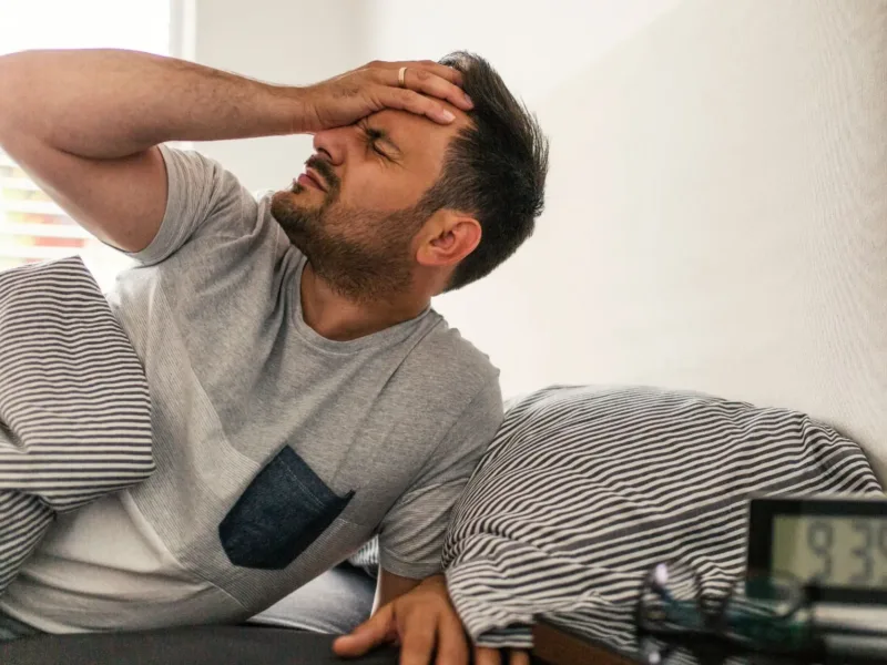 Man holding his head