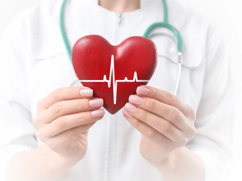 Doctor holding heart shape