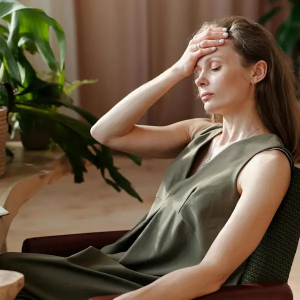 Woman with migraine