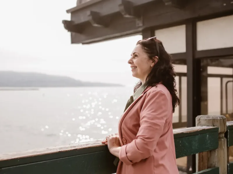 Woman looking at the ocean
